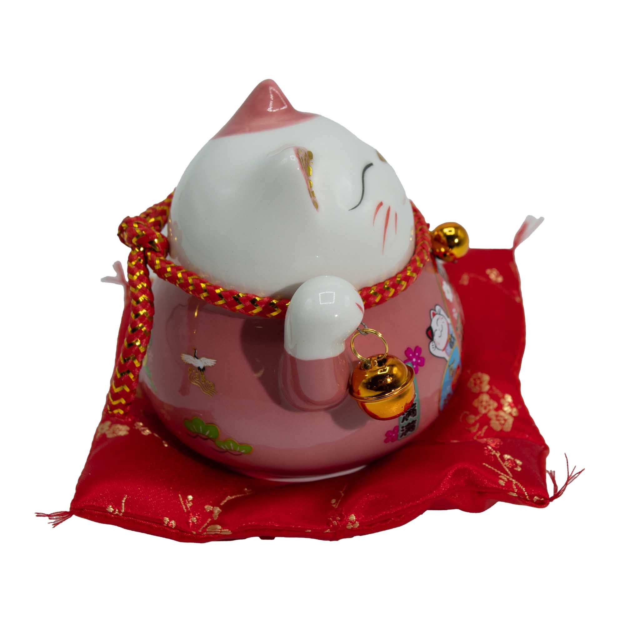 bG9jYWw6Ly9tZWRpYS9TSi80RC82MFIzMEMxSjY0VzM0RFNKL2FkNTE1ZjQyLmpwZw Ceramic Money Cat Moving Hand - Pink on Cushion (battery not included) - Image 1